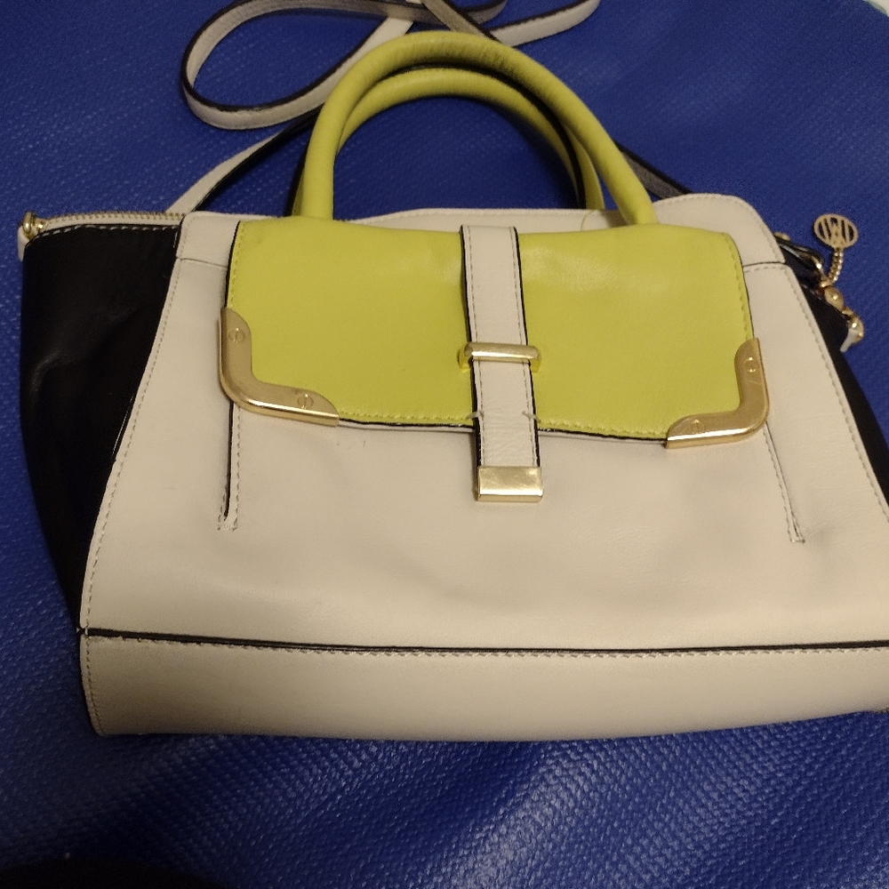 Designer purse by Antonio Melani. Flip pocket in front to inside plus a cardhold